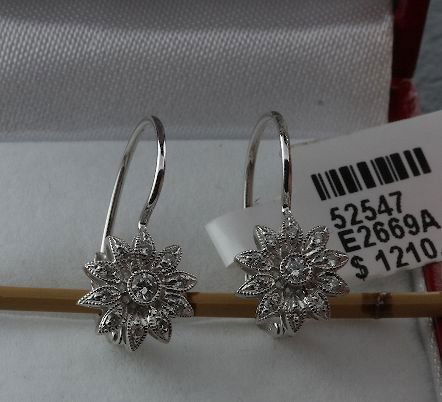 14KT White Gold & .15 Diamond Earrings FJ125: 14KT White Gold & .15 Diamond Earrings FJ125 - Fabulous Condition - SP151A6 - Thank you for viewing this lot. We have many great items for sale. Please check our future auctions and listings from Seiz