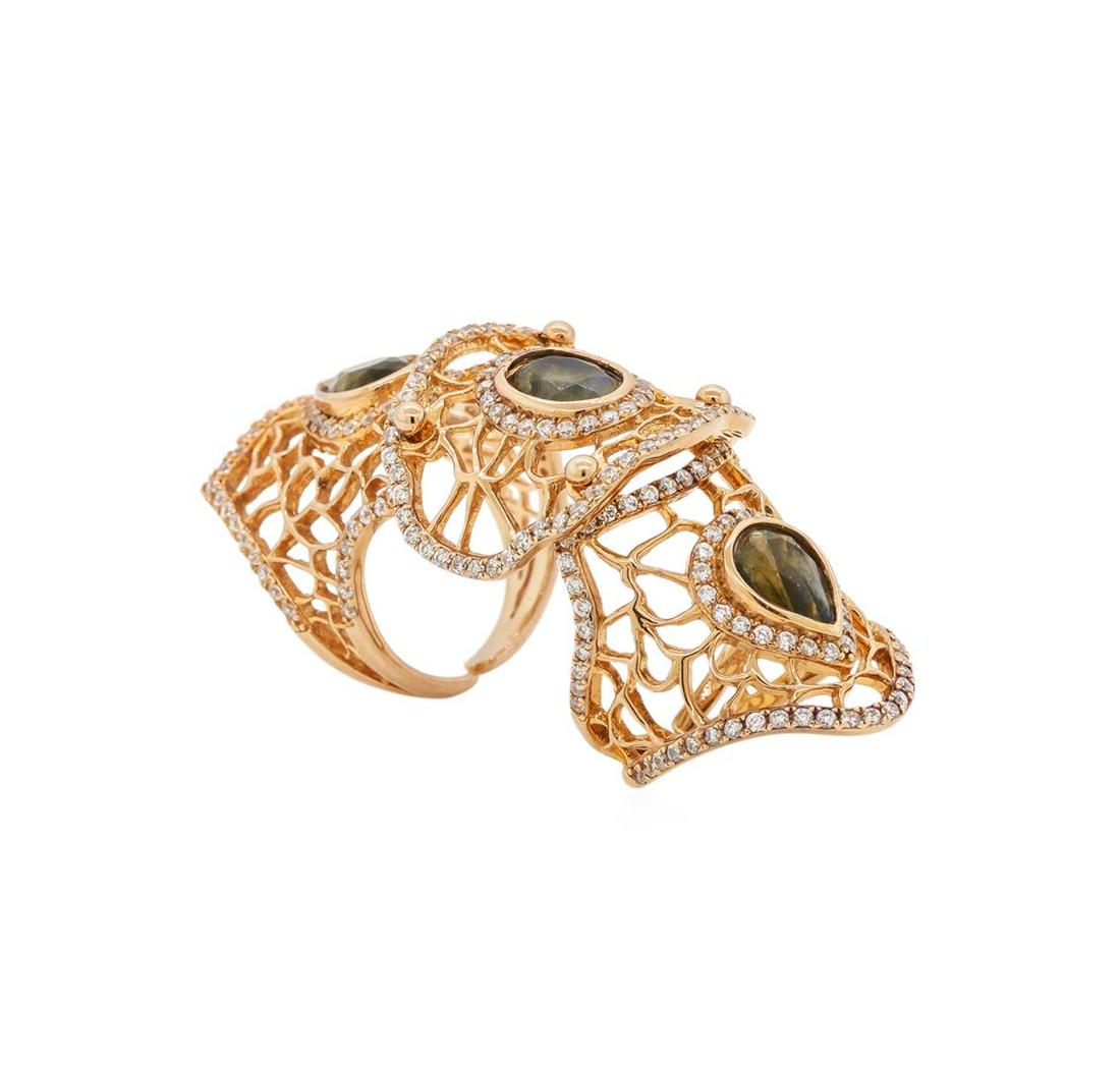 Sterling Silver Ring: One of a kind high fashion sterling silver Ring weighing 12.8 grams. Containing: Labradorite, Cubic Zirconia. This sterling silver promises a lasting shine.