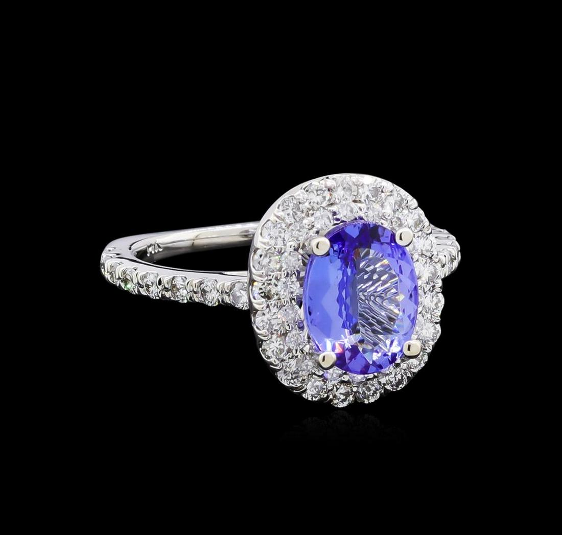 1.78 ctw Tanzanite and Diamond Ring - 14KT White Gold: One ring featuring: 14KT white gold weighing 4.42 grams containing one tanzanite with a total weight of 1.78ct and diamonds with a total weight of 0.84ct.