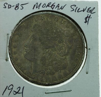 1921 Morgan Silver Dollar SD85: 1921 Morgan Silver Dollar SD85 - As-Is Condition - Thank you for viewing this auction. We appreciate your business. Check out our future auctions from Seized Assets Auctioneers.