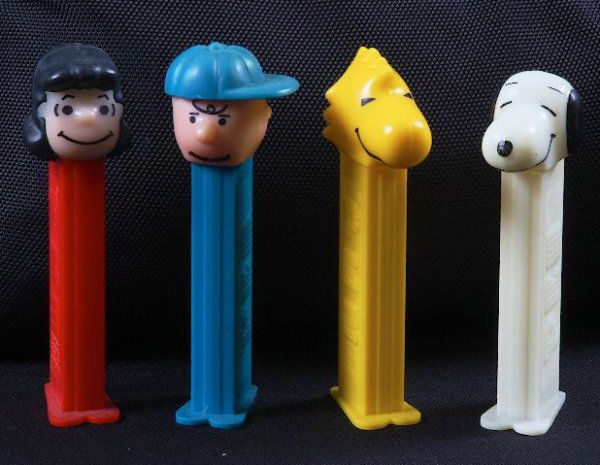 Peanuts #3 - Lot of (4) Vintage Pez Dispensers: Peanuts #3 - Lot of (4) Vintage Pez Dispensers - Excellent Used Condtion. Good paint, no cracks, working condition. - Thank you for bidding on this lot. We appreciate your business. Be sure to check o