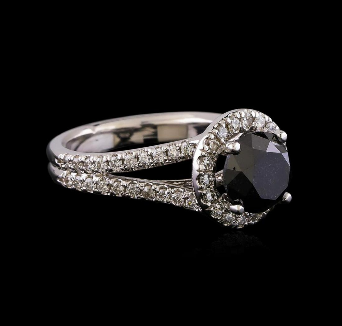 3.58 ctw Black Diamond Ring - 14KT White Gold: One electronically tested 14KT white gold lady's cast wedding ring with a split shank basket halo with a bright polish finish. The featured lady's ring has a double shank measuring 3.76 millimeters wi