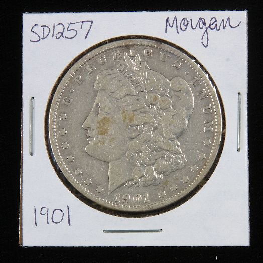 1901 Morgan Silver Dollar SD1257: 1901 Morgan Silver Dollar SD1257 - Good Vintage/Circulated Condition. AT71J8. - Thank you for viewing this auction. We appreciate your business. Check out our future auctions from Seized Assets Auctio