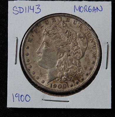 1900 Morgan Silver Dollar SD1143: 1900 Morgan Silver Dollar SD1143 - AE817D - Thank you for bidding on this item. We appreciate your business. Be sure to check out all of the upcoming auctions offered by Seized Assets Auctioneers!