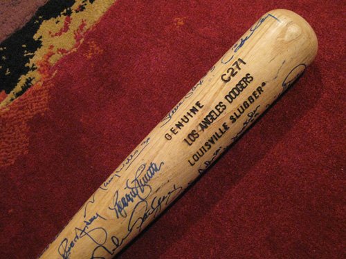 Los Angeles Dodgers Game Used Bat Signed by 28 Leg: Los Angeles Dodgers Game Used Bat Signed by 28 Legends - (K) A must for any Dodger Collector. Very cool item. (K) Great for framing. Signed by Steve Garvey, Duke Snider, Don Newcombe, Maury Wills, Bil