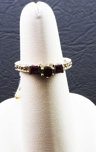 Ladies Diamond & Ruby Ring .55cts FJ27: Ladies Diamond & Ruby Ring .55cts FJ27 - As-Is Condition FJ 5W78KL - Thank you for viewing this auction. We appreciate your business. Check out our future auctions from Seized Assets Auctioneers.