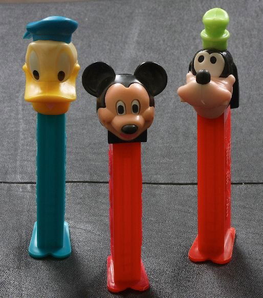 Disney #40 - Lot of (3) Vintage Pez Dispensers: Disney #40 - Lot of (3) Vintage Pez Dispensers - Excellent Vintage Used Condtion. Good paint, no cracks, working condition. - Thank you for viewing this lot. We are always adding new inventory and new