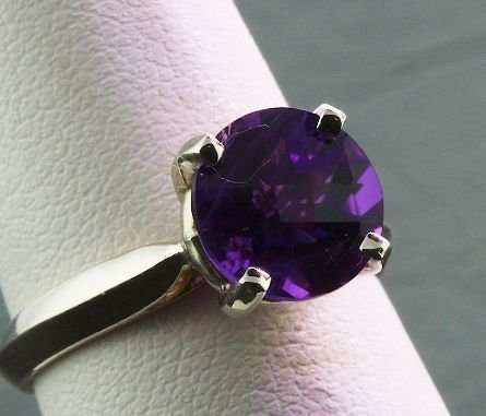 Amethyst Solitaire Ring 3.70 grams A138 FULL APPRA: Amethyst Solitaire Ring 3.70 grams A138 FULL APPRAISAL - Excellent Condition - Amethyst 2.20ct. Comes with full appraisal from AIG. Valued at $975.00. Great color, nice quality. Check out the scans! -