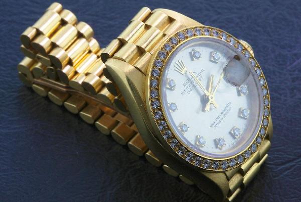 Ladies 18KTY Gold Rolex President DateJust A380 Wr: Ladies 18KTY Gold Rolex President DateJust A380 Wristwatch - Amazing Watch - 74.88 gm - Circa 1988. Forty (40) round brilliant cut diamonds adorn this watch = 1.00cts. Comes with a Full Appraisal lett