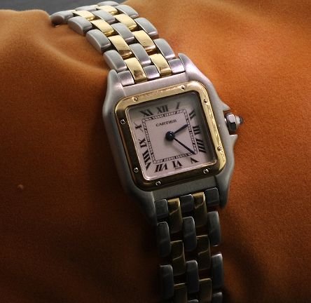 Ladies Two-Tone Cartier Panthere 41.20 Grams Watch: Ladies Two-Tone Cartier Panthere 41.20 Grams Watch W29 - Excellent Condition. CD1061S9. Great looking watch. Comes with a full apprasial letter from AIG. Appriased for $4,250.00. - Thank you for viewi