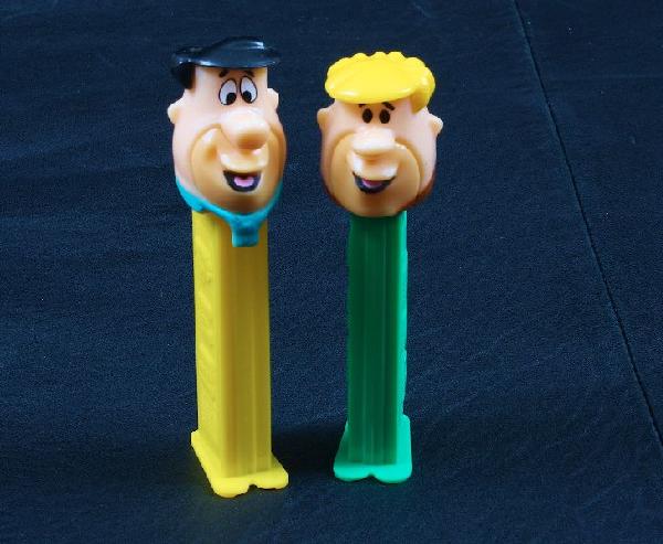 Flinstones #48 - Lot of (2) Vintage Pez Dispensers: Flinstones #48 - Lot of (2) Vintage Pez Dispensers - Excellent Vintage Used Condtion. Good paint, no cracks, working condition. - Thank you for viewing this lot. We are always adding new inventory and