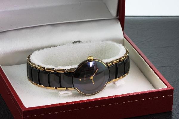 Women's Rado La Coupole Watch NS6: Women's Rado La Coupole Watch NS6 - Excellent Condition! Salka. Beautiful women's watch made by Rado in La Coupole design. This 2 tone black and gold ceramic watch is in pristine condition! - Thank yo