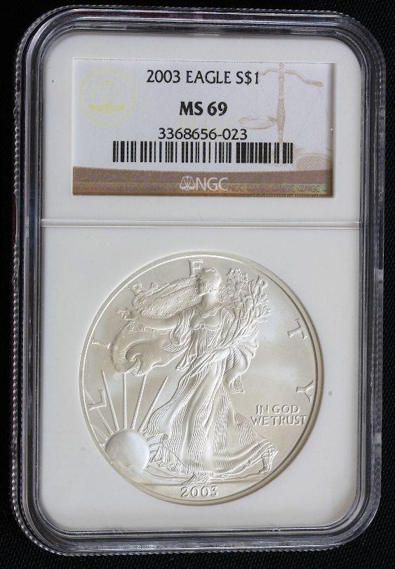 2003 Silver American Eagle NGC MS69 - JH232: 2003 Silver American Eagle NGC MS69 - JH232 - Great item. JH - EW52M5. 2003 Silver American Eagle NGC MS69 - JH232 - Thank you for viewing this lot. We are always adding new inventory and new auctions