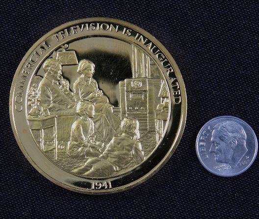 "Commercial Television" #90 24Kt Gold Plated Sterling S: Commercial Television" #90 24Kt Gold Plated Sterling Silver Medal This is a rare Franklin Mint "History of Mankind" 24kt. Gold Plated over Sterling Silver Medal. Coin weights 1.985 Troy Oz. (Nearly 2