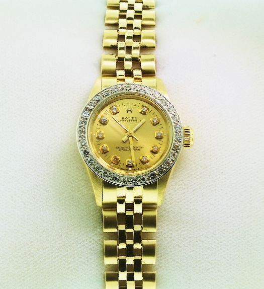 Ladies 14KTY Gold Rolex Oyster Perpetual Wristwatch A61: Ladies 14KTY Gold Rolex Oyster Perpetual Wristwatch A610 Excellent Condition! One ladies hand crafter & machine milled Rolex Oyster Perpetual model wristwatch electronically tested 14KT yellow gold c.