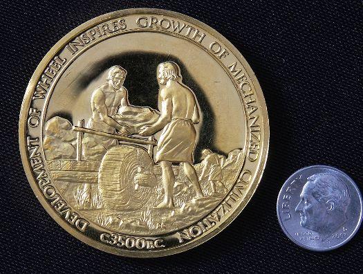 "Inventing The Wheel" #3 24Kt Gold Plated Sterling Silv: Inventing The Wheel" #3 24Kt Gold Plated Sterling Silver Medal This is a rare Franklin Mint "History of Mankind" 24kt. Gold Plated over Sterling Silver Medal. Coin weights 1.985 Troy Oz. (Nearly 2 ful