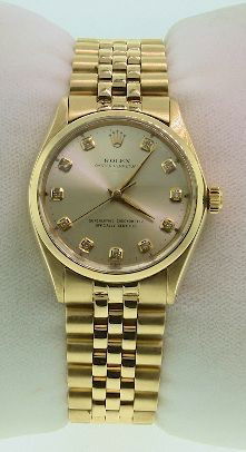 Rolex 14KT Yellow Gold Oyster Perpetual Wristwatch 93.7: Rolex 14KT Yellow Gold Oyster Perpetual Wristwatch 93.72 gm. Excellent Condition! One, hand crafted & machine milled Rolex Oyster Perpetual wristwatch electronically tested 18KT yellow gold, Circa: 19