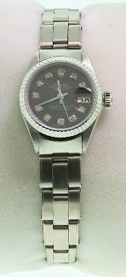 Lady Rolex Stainless DateJust Wristwatch 40.07 gm. A860: Lady Rolex Stainless DateJust Wristwatch 40.07 gm. A761 Excellent Condition! One Ladies, hand crafted & machine milled Rolex DateJust Model Stainless Steel wristwatch electronically tested. Circa: 197