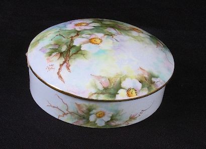 Antique Limoges Hand Painted Dresser Jar & Lid: Antique Limoges Hand Painted Dresser Jar & Lid Nice Condition, Good Color and Detail. 3A54W7. ED Lot. This lot measures 1 3/4 H x 5 1/2" W - Thank you for viewing this lot. We are always adding new in