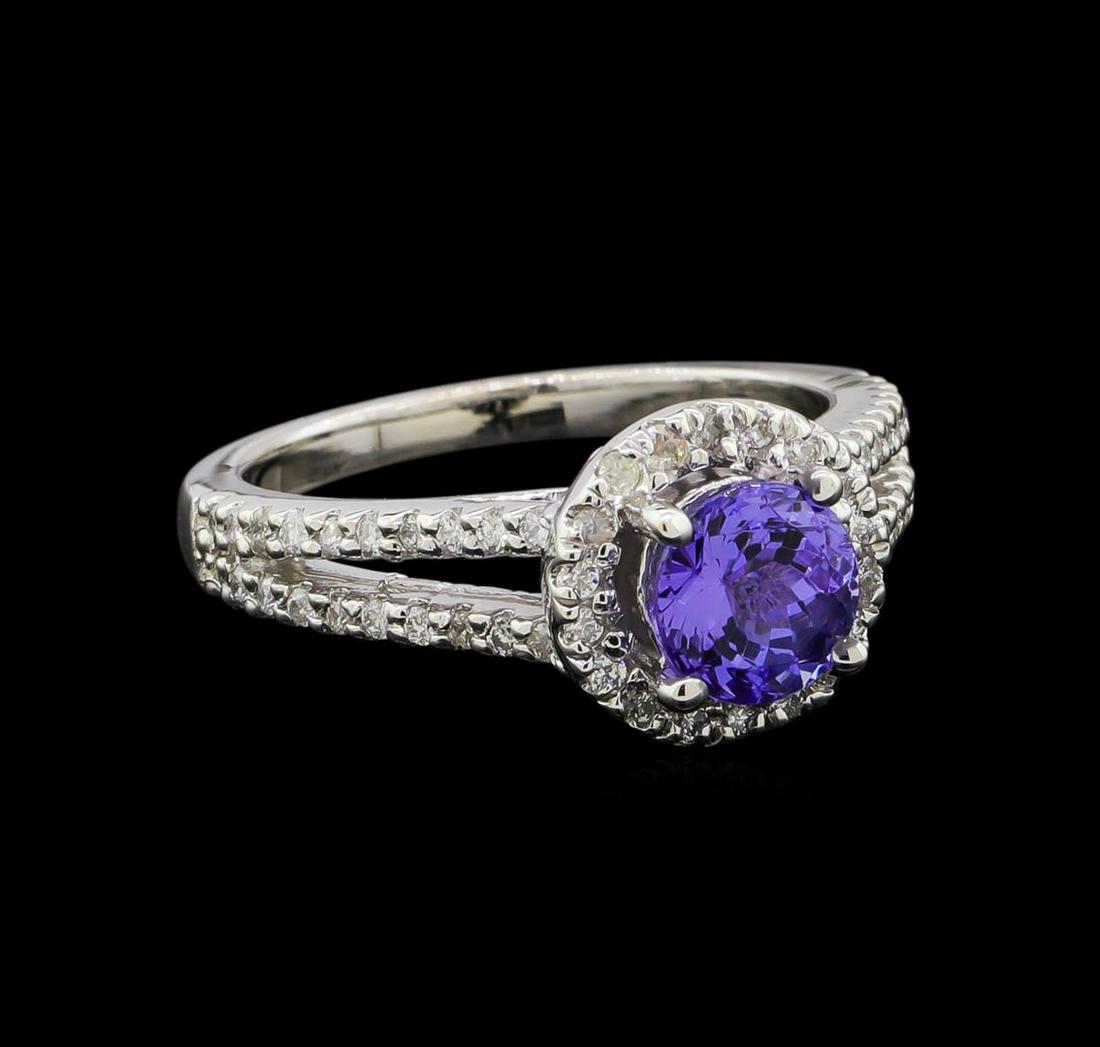 1.37 ctw Tanzanite and Diamond Ring - 14KT White Gold: One ring featuring: 14KT white gold weighing 5.23 grams containing one tanzanite with a total weight of 1.37ct and diamonds with a total weight of 0.35ctw.