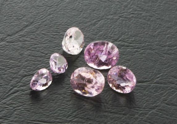 Kunzite Beryl Parcel 6 Gemstones 14.95cts - DI253: "Kunzite Beryl Parcel 6 Gemstones 14.95cts - DI253 Excellent Condition. Comes with appraisal from GLA. Check out the scans. Appriased for $1,869.00 - Thank you for viewing this lot. We are always addi