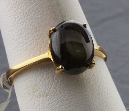 Black Star Sapphire Ring 2.90 grams A141 FULL APPRAISAL: Black Star Sapphire Ring 2.90 grams A141 FULL APPRAISAL - Excellent Condition - Black Star Sapphire 4.00ct.. Comes with full appraisal from AIG. Great color, nice quality. Check out the scans! - Thank