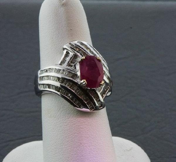 Ruby & Diamond Ring 9.71 grams A241 FULL APPRAISAL: Ruby & Diamond Ring 9.71 grams A241 FULL APPRAISAL - Excellent Condition. Ruby 2.77ct. & Diamond 1.81ct. Comes will FULL LETTER from AIG. See Scan. Valued at $6,865.00. - Thank you for viewing this lo