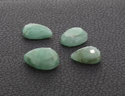 Emerald Parcel 4 Gemstones. 26.17cts. BS81: Emerald Parcel 4 Gemstones. 26.17cts. BS81 Excellent Condition! Four light green Emerald (Beryl) Mixed cut gemstones. 26.17cts. Estimated retail value: $4,606.00.. Thank you for viewing this lot. We a