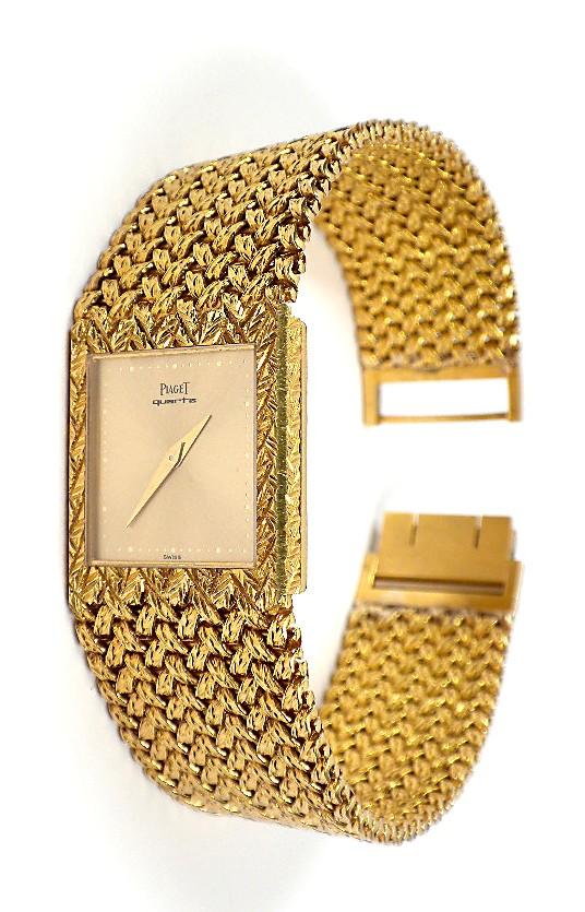 Vintage 18KT Yellow Gold Gents Piaget Dress Wristwatch.: Vintage 18KT Yellow Gold Gents Piaget Dress Wristwatch. 87.59gm. A1303. Excellent Condition! VF1062XI. One gents, custom cast & assembled Vintage Piaget 18KTY gold wristwatch electronically tested. Co