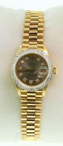Ladies 18KTY Gold Rolex Diamond DateJust Wristwatch. 0.: "Ladies 18KTY Gold Rolex Diamond DateJust Wristwatch. 0.33ct. A910 Excellent Condition! One ladies, hand crafted & machine milled Rolex DateJust model the Lady President wirstwatch electronically test