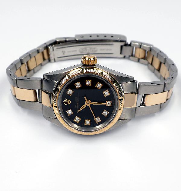 Lady Rolex Two-Tone Oyster Perpetual Wristwatch. 41.09g: "Lady Rolex Two-Tone Oyster Perpetual Wristwatch. 41.09gm. A1300. Excellent Condition! BC1031QA. One Ladies, hand crafted & machine milled Rolex Oyster Perpetual Model Stainless Steel & 14KT yellow go