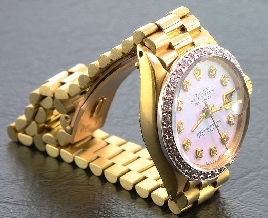 Ladies 18KTY Gold Rolex Diamond DateJust A376 Wristwatc: "Ladies 18KTY Gold Rolex Diamond DateJust A376 Wristwatch - Amazing Watch - 57.11 gm - 18KT Yellow Gold. Circa 1963. Contains 33 round brillant cut diamonds = 0.36ct. Comes with a Full Appraisal lette