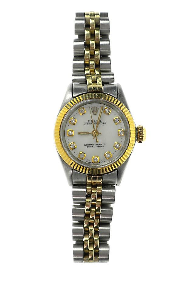 Lady Rolex Two-Tone Oyster Perpetual Wristwatch A648: "Lady Rolex Two-Tone Oyster Perpetual Wristwatch A648 Excellent Condition! One ladies, hand crafted & machine milled Rolex Oyster Perpetual Model Stainless Steel & 14KT yellow gold wrist watch electro
