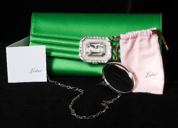 $1,995 Judith Leiber Purse. ED397: "$1,995 Judith Leiber Purse. ED397. Excellent Condition! NJ104CF. NWT Judith Leiber evening bag, comes with Leiber mirror in pouch.. Thank you for viewing this lot. We are always adding new inventory