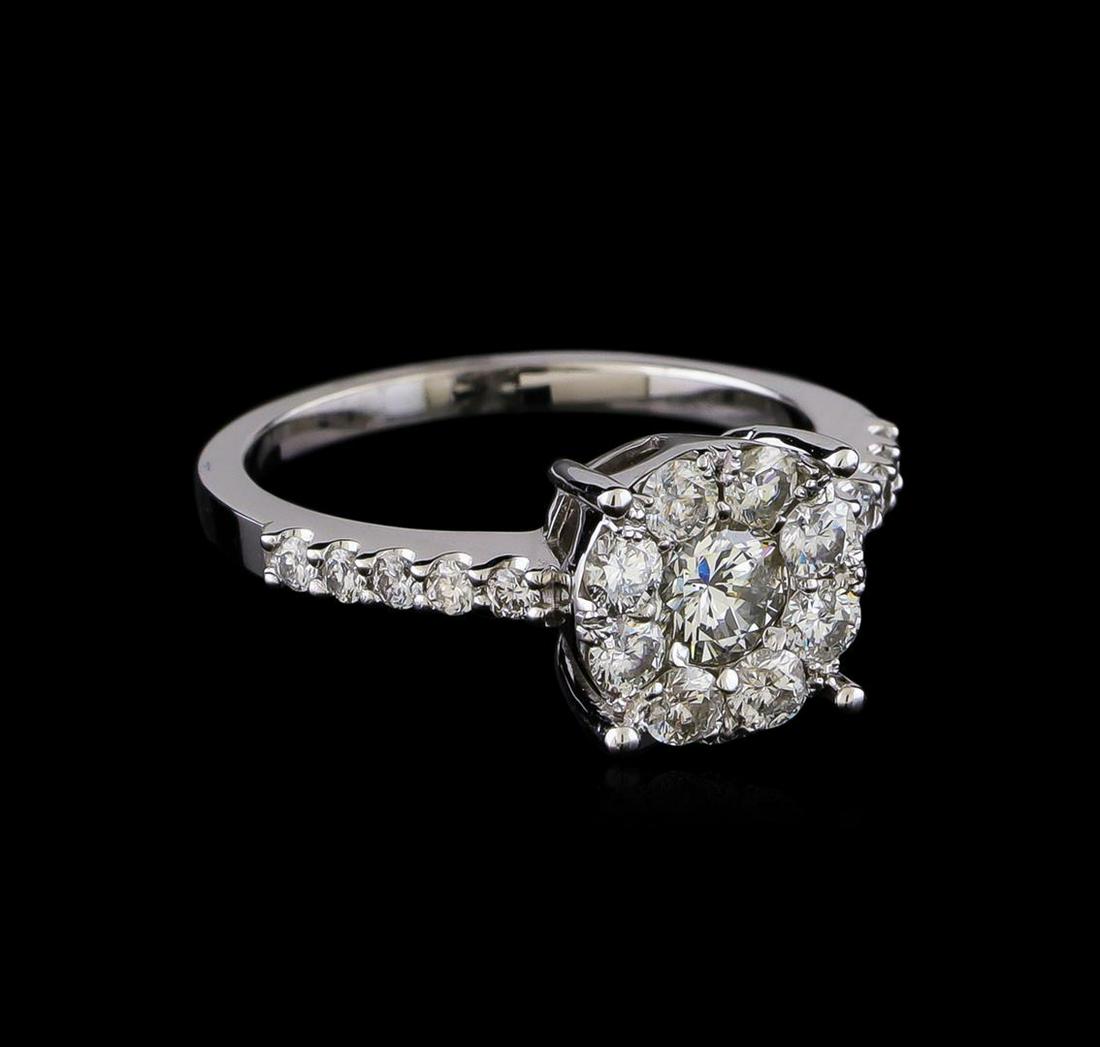 1.08 ctw Diamond Ring - 14KT White Gold: One electronically tested 14KT white gold lady's cast wedding ring with a cathedral basket halo with a bright polish finish. The featured lady's ring has a shank measuring 1.68 millimeters in width. I