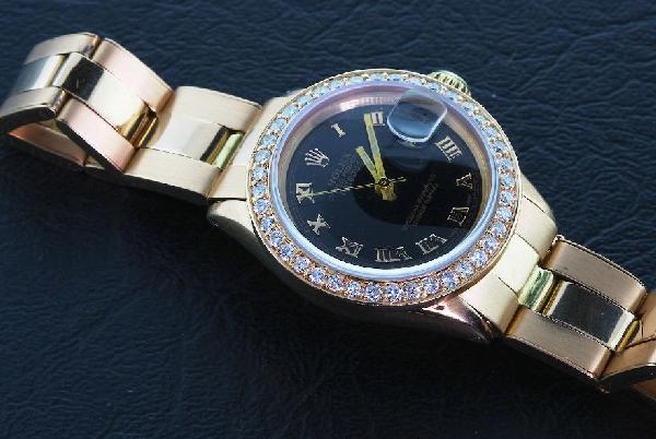 Ladies 18KT Gold Rolex DateJust A370 Wristwatch: "Ladies 18KT Gold Rolex DateJust A370 Wristwatch - Amazing Watch - 55.49 gm - Circa 1972, 18KT Rose Gold. Contains 40 round brillant cut diamonds = 0.86ct. Comes with a Full Appraisal letter from AIG.