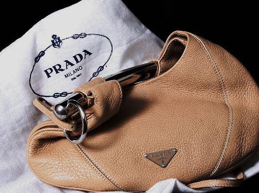 Vintage Prada Handbag Clutch. ED439: "Vintage Prada Handbag Clutch. ED439. Excellent Vintage Condition! XZ751XR. Great vintage tan/beige Prada handbag/clutch. Comes with original dustbag. 11.5" wide x 11" high.. Thank you for viewing thi