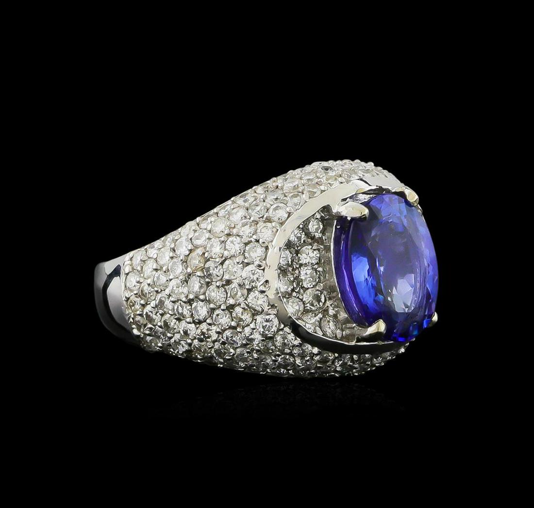 14KT White Gold 2.69 ctw Tanzanite and Diamond Ring: One electronically tested 14KT white gold ladies combination cast & assembled engagement ring with a bright polish finish. Identified with markings of "K14". Condition is new. Containing: One prong se