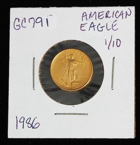1986 American Eagle $5 Gold Coin MCMLXXXVIII GC791: "1986 American Eagle $5 Gold Coin MCMLXXXVIII GC791 Tough to find American Eagle 1/10 oz. $5.00 Gold Coin. W3551E3. This rare issue is from 1986 and the date is written in Roman Numerals. - Thank you 