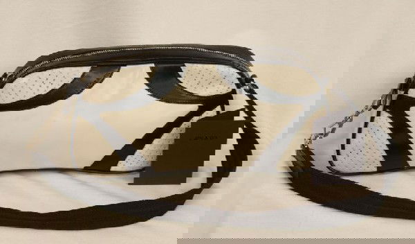 New Prada Leather Bowling Bag ED560: "New Prada Leather Bowling Bag ED560. Excellent Condition! IL531KJ. This is a Vintage PRADA CREAM BLK BOWLING BAG retailing for $760 at Neiman Marcus. It still has the original price tag in the pocket