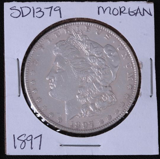 1897 Morgan Silver Dollar SD1379: "1897 Morgan Silver Dollar SD1379 Great Circulated Condition. AE8150. - Thank you for viewing this lot. We are always adding new inventory and new auctions, so check back often. We appreciate your bus