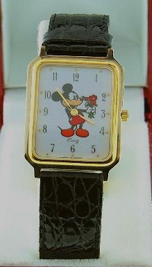 French Avronel "Mickey Mouse" Watch Quartz. NS62: "French Avronel "Mickey Mouse" Watch Quartz. NS62. Excellent Vintage Condition! SLKA. Vintage Avronel brand made in France Mickey Mouse Watch. Mickey holding flowers. Thank you for viewing this lot. W