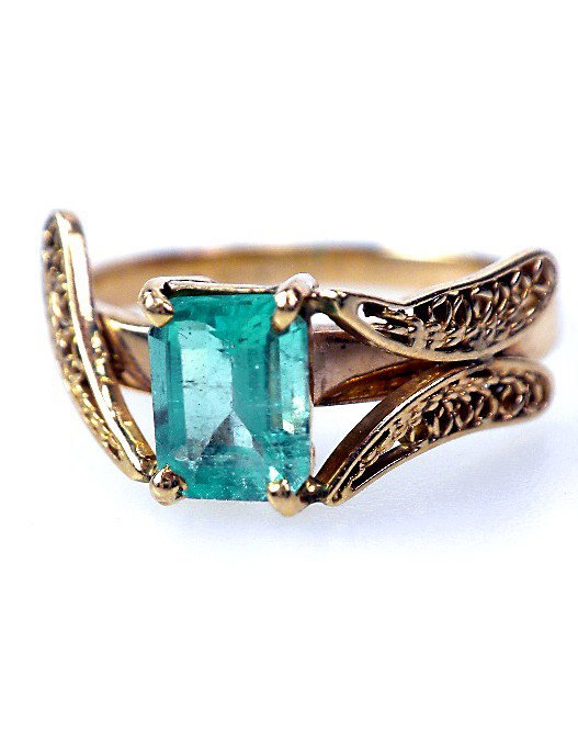 14KT Yelow Gold Emerald Solitaire Ring 0.78ct A1584: "14KT Yelow Gold Emerald Solitaire Ring 0.78ct A1584. Excellent Condition! One electronically tested 14KT yellow gold ladies cast & assembled emerald solitaire ring with a bright polish finish. One pr