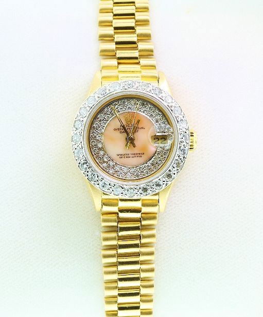 Ladies 18KTY Gold Rolex Diamond DateJust Wristwatch A60: Ladies 18KTY Gold Rolex Diamond DateJust Wristwatch A609 Excellent Condition! One ladies hand crafted & machine milled Rolex DateJust model the Lady President wristwatch electronically tested 18KT yel