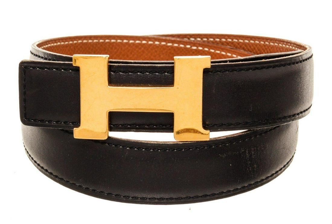 Hermes Black Leather H Belt: Hermes Black Leather H Belt with leather gold-tone hardware and turn lock closure.