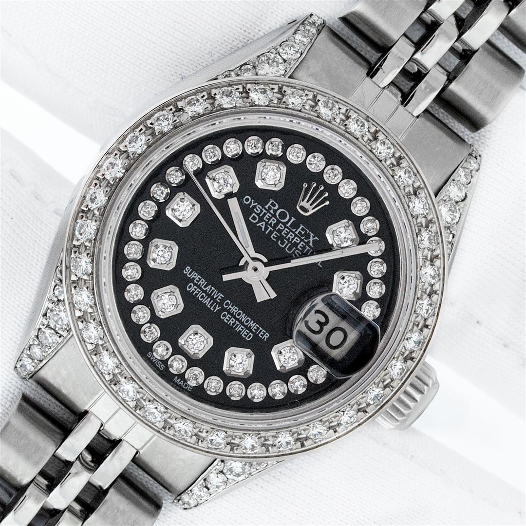 Rolex Ladies Stainless Steel 26MM Black Diamond Lugs: One Ladies Stainless Steel Rolex Datejust Polished Bright with Satin Finish, Serviced & Electronically Tested, Stainless Steel Case: 26mm, Stainless Steel Crown, Diamond Lugs: 24 Diamonds On Lugs, Cla