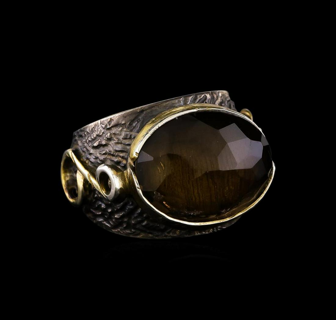 Sterling Silver Ring: One of a kind high fashion sterling silver Ring weighing 16.1 grams. Black Antique texture. Containing: Smoky Quartz. This sterling silver promises a lasting shine.