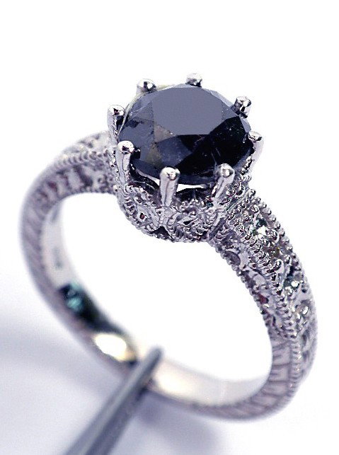 14KT White Gold Ladies Black & White Diamond Ring 1.78c: 14KT White Gold Ladies Black & White Diamond Ring 1.78ct. A750 Excellent Condition! One 14KT White Gold Ladies Cast Black & White Diamond Ring. Condition is new, good workmanship. The featured diamond