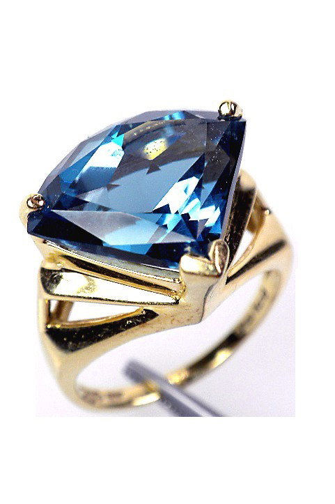 14KT Yellow Gold Blue Topaz Solitaire Ring 8.87ct A1698: "14KT Yellow Gold Blue Topaz Solitaire Ring 8.87ct A1698. Excellent Condition! One electronically tested 14KT yellow gold ladies cast blue topaz solitaire ring with a bright finish. Trademark is Thail