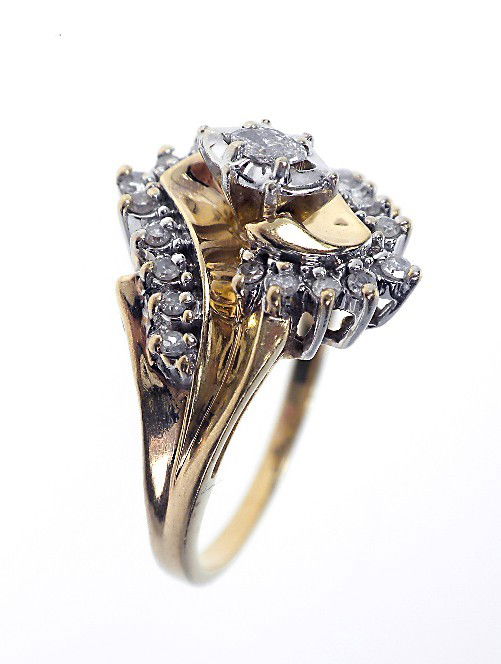 10KT White Gold Diamond Cluster Ring 0.25ct. A1538: "10KT White Gold Diamond Cluster Ring 0.25ct. A1538. Excellent Condition! One electronically tested 10KT white gold ladies cast & assembed diamond cluster ring. Bright polish finish. Identified with m